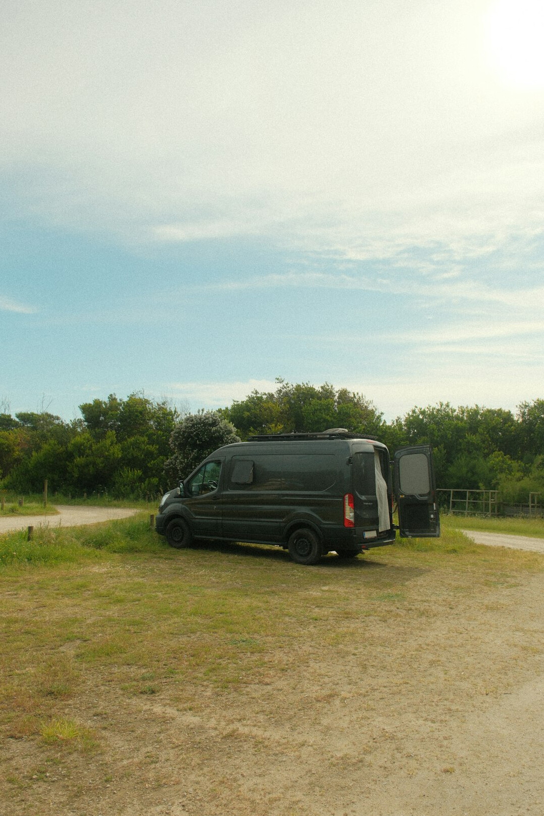 Outside broadcast van with satellite dish deployed for a live feed